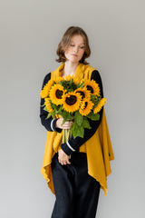 Eleganter Woll-Poncho mit zeitlosem Schnitt