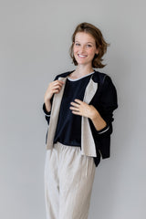 Wendeweste aus reinem Leinen – sand & schwarz